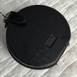 CALPAK Black Croc-Embossed Round Case